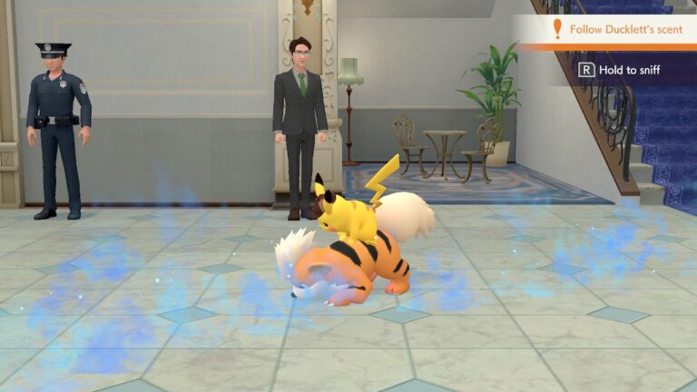 Growlithe following a blue scent trail